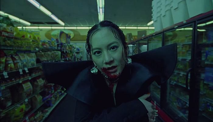 Japanese Breakfast posing in bondage video