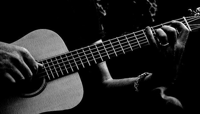 black and white acoustic guitar